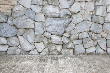 Old Stone wall with floor cement texture background