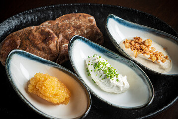 pita with different dips and white wine