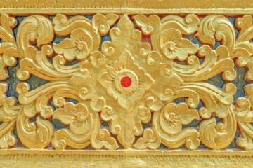 Background of cement gold decorative pattern,Traditional thai design in Thailand Temple wall