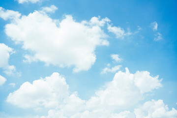 Obraz na płótnie Canvas Cloudscape with fluffy white cloud in blue sky.