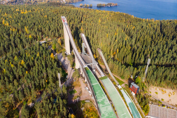 Aerial view of Lahti sports centre with three ski jump towers.
