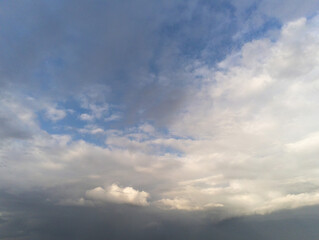 Beautiful white fluffy cloudy sky background,