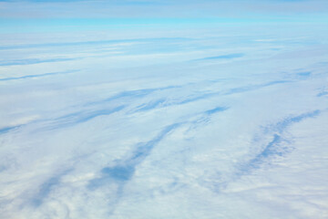 Only clouds below . White snowy cloudscape background