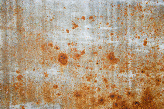Grunge rusty light metal background texture or backdrop, high resolution.