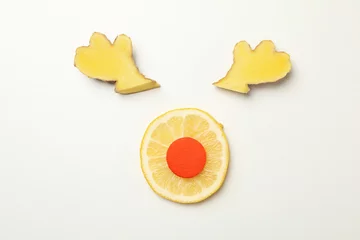 Fototapete Hipster Tiere Deer antlers made of ginger and lemon on white background  © Atlas