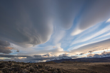 Extreme weather conditions, dramatic red clouds in the Glacier National Park in Argentina.