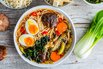 Ramen soup with noodles and traditional ingredients.