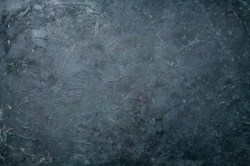 Obraz premium Old black abstract concrete background. Grunge texture. Dark wallpaper. Blackboard. Chalkboard. Top view, copy space