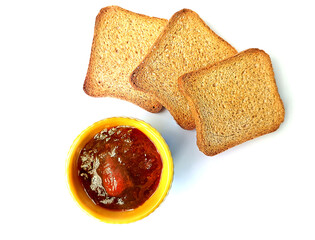 Biscuits and Jam in a yellow cup on white background.