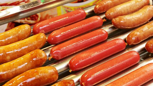 Cooking street food of hotdogs and sausages on walking street Guilin China