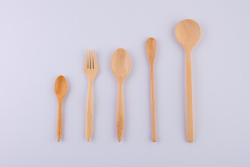 Kitchenware set of wooden spoon and wooden fork isolated on white background
