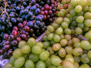 red and white grapes are sold in Market in Brazil
