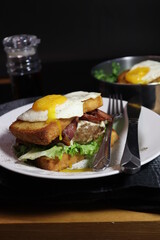 beef sandwich with runny egg
