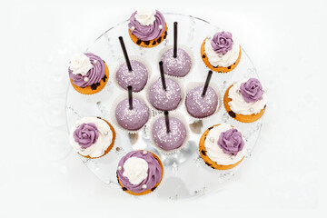 sweet cakes beautiful arranged on the white table