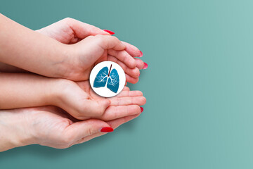 Adult and child hands holding lung, world tuberculosis day, world no tobacco day, lung cancer, coronavirus covid-19, Pulmonary hypertension, Pneumonia, copd, eco air pollution,organ donation concept