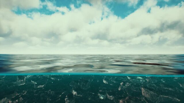 Split view over and under water in the Caribbean sea with clouds