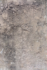 graue rissige Stein Wand als Hintergrund