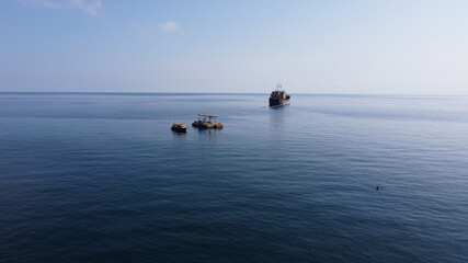 A fishing boat near the coast in the Black Sea in Crimea. Fishing for red mullet, horse mackerel, gobies and others