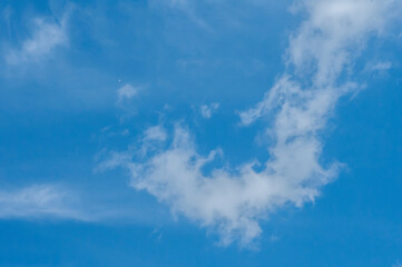 White clouds on blue sky as cloudy background