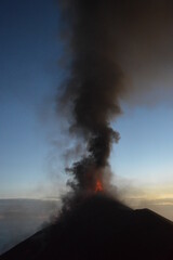The volcano Fuego erupting with exploding lava, magma and ashes in Guatemala