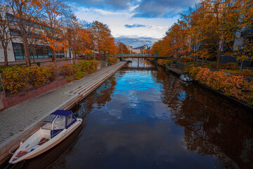 Helsinki, Uusimaa, Finland October 13, 2020 View of the water canal and boats Autumn evening
