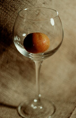 apple in a glass, promoting a healthy lifestyle, choose fruit instead of alcohol