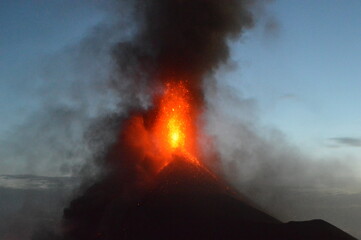 The volcano Fuego erupting with exploding lava, magma and ashes in Guatemala