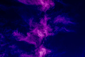 Fototapeta na wymiar Abstract purple fluid texture on dark background