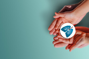 Adult and child hands holding lung, world tuberculosis day, world no tobacco day, lung cancer, coronavirus covid-19, Pulmonary hypertension, Pneumonia, copd, eco air pollution,organ donation concept