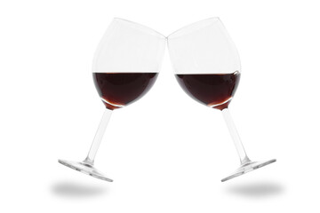 two red wineglass making a toast isoalated on white background with  clipping path around the glasses and copy space for your text