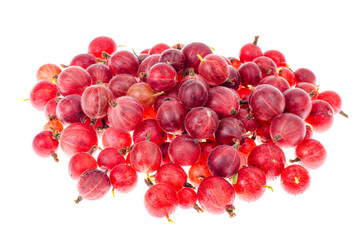 Fototapeta premium Heap of red gooseberry berries isolated on white background.