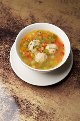 Soup with chicken meatballs and vegetables