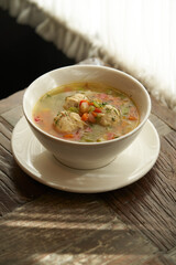 Soup with chicken meatballs and vegetables
