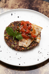 Sea bass fish with quinoa risotto and vegetable salad