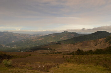 Obraz premium Sunrise hiking and camping on the top of the active Volcan Acatenango while the Volcano Fuego is erupting - Guatemala