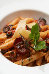 Pasta Penne with Tomato, olives and Basil