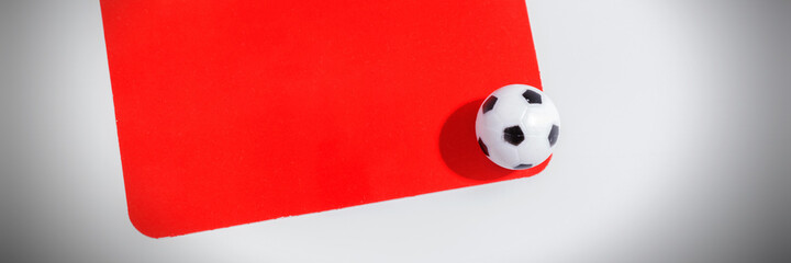 Red card with ball for sport concept. Panoramic image