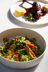 Avocado salad with fresh leaves and vegetable