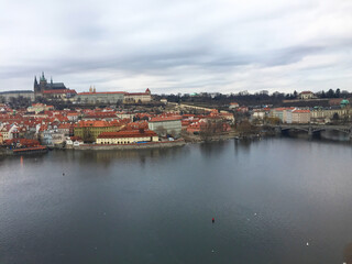 Naklejka na ściany i meble cityscape of Vltava River and Charles bridge from Old town in Prague, Czech Republic