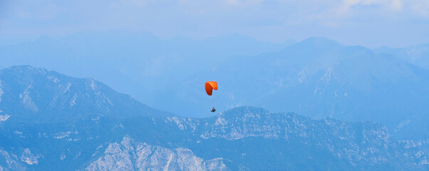 Paragliding over Lake Garda from Monte Baldo mountain. Panoramic view of Lago di Garda, Veneto region of Italy