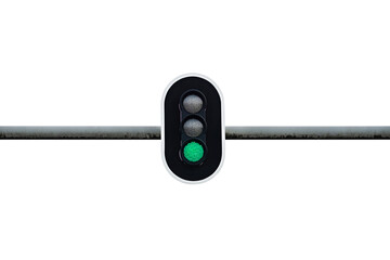 Traffic light showing green color, mounted above the road on a metal scaffold, isolated on a white...