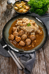 Minced meat balls in mushroom sauce.