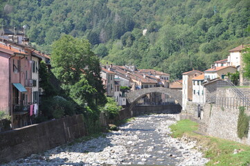 Fototapeta na wymiar the medieval stony bridge over the river Vara, Varese Ligure, La Spezia province, Liguria, Italy