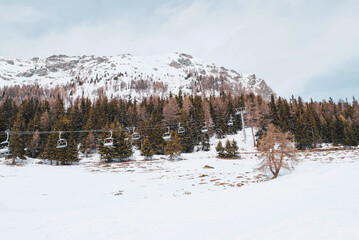 Winter landscape with mountain slopes covered with snow.