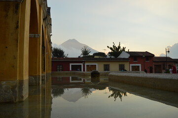 Obraz premium Sunrise over the stunning volcanoes and Lake Atitlan in Guatemala, Central America