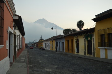 Fototapeta na wymiar Sunrise over the stunning volcanoes and Lake Atitlan in Guatemala, Central America