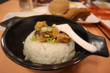 Black pepper chicken teriyaki rice in a bowl, ready to eat. Asian cuisine fast food reastaurant meal