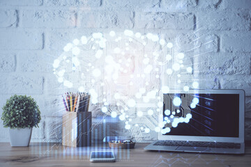 Double exposure of desktop computer and human brain drawing hologram. Ai concept.