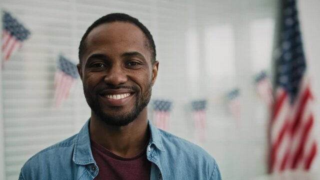 Portrait video of black man in ballot place. Shot with RED helium camera in 8K.