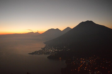 Sunrise over the volcanoes of Lake Atitlan in Guatemala, Central America